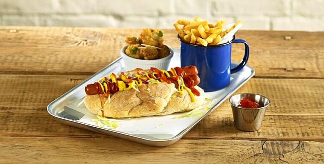 Hot Dog Served on a Galvanised Tray with Enamel Cup for Chips