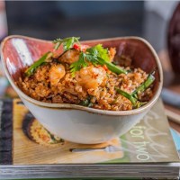 Stonecast Berry Red Triangle Bowl with food